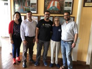 Photo of Dr. Arturo Massol Deya with his mother and three members of Team GPII