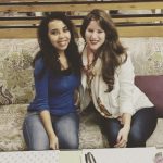 Image of Caitlin Rusche, right, with friend Shaimaa, left
