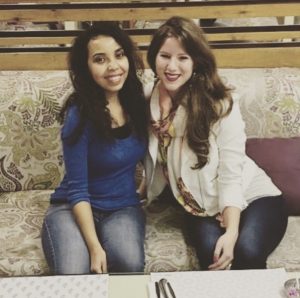 Image of Caitlin Rusche, right, with friend Shaimaa, left