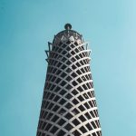 White and Black tower under blue sky