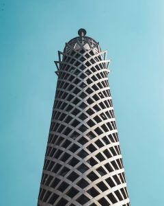 White and Black tower under blue sky